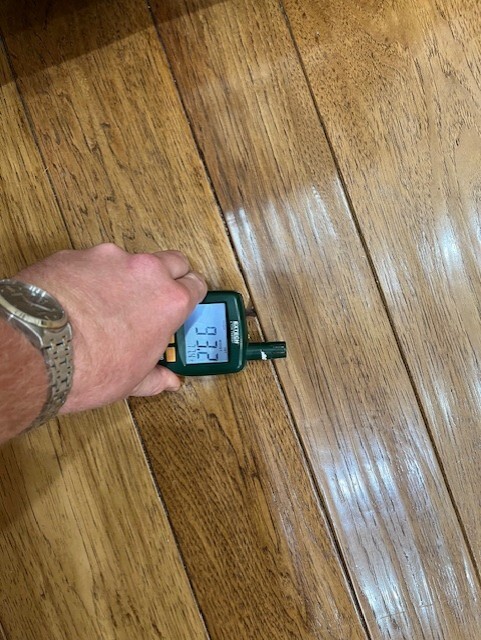 Water damaged flooring buckling